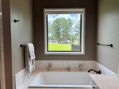 Wake up to peaceful lake views and spend your days surrounded by - photo 20