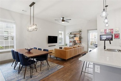 Bright, open double corner unit located just one block from the