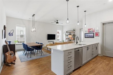 Bright, open double corner unit located just one block from the