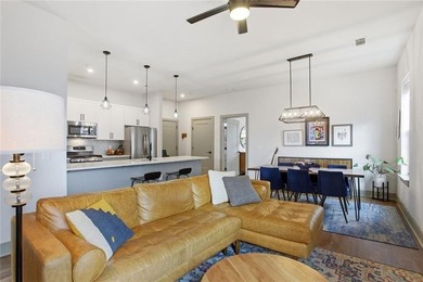 Bright, open double corner unit located just one block from the