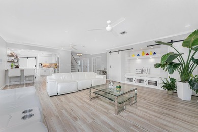 Experience refined waterfront living in this extensively - photo 2