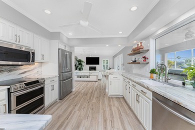 Experience refined waterfront living in this extensively - photo 8