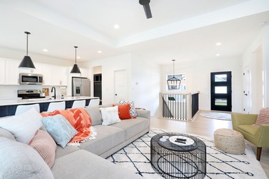 This stunning home is sure to impress with its 4 bedrooms, 3 - photo 3