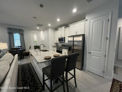 Custom-built in 2022, this beautifully designed 3-bedroom - photo 12