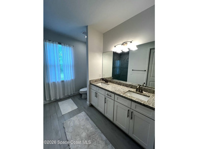 Custom-built in 2022, this beautifully designed 3-bedroom - photo 20
