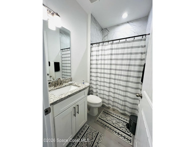 Custom-built in 2022, this beautifully designed 3-bedroom - photo 25