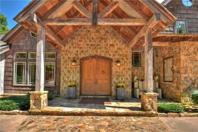 THIS ONE OF A KIND RUSTIC home on private 2.14 acre lot in the
