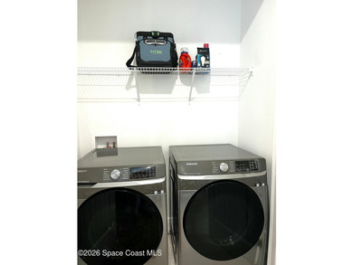 Custom-built in 2022, this beautifully designed 3-bedroom - photo 29