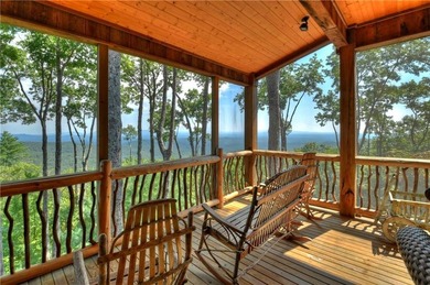 THIS ONE OF A KIND RUSTIC home on private 2.14 acre lot in the