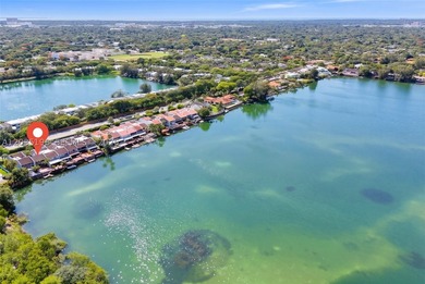 Rarely available lakefront townhouse in Marina Lakes, a private - photo 4