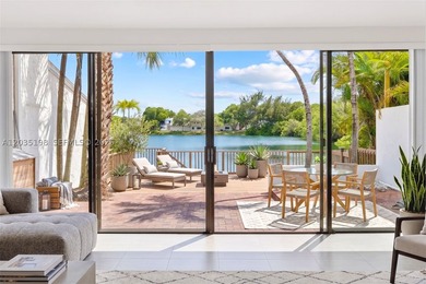 Rarely available lakefront townhouse in Marina Lakes, a private - photo 7
