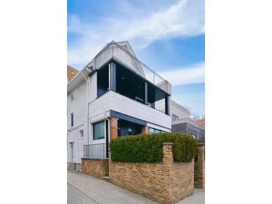 Beautiful fully renovated, detached 3-family home offering - photo 3