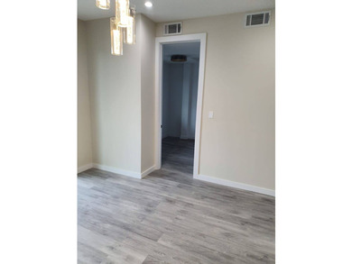 Beautiful fully renovated, detached 3-family home offering - photo 6