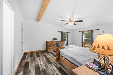 Tucked away among nearly 39 acres of towering timber, this East - photo 12
