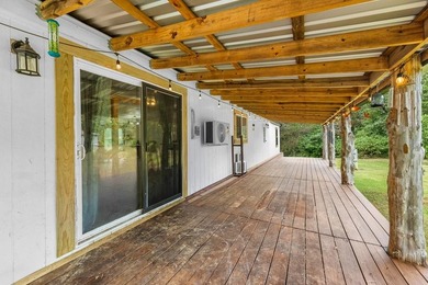 Tucked away among nearly 39 acres of towering timber, this East - photo 27