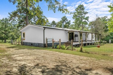 Tucked away among nearly 39 acres of towering timber, this East - photo 28