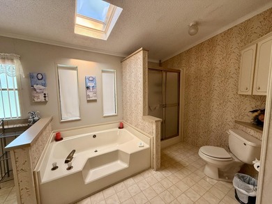 Welcome to this charming 2-bedroom, 2-bathroom manufactured home - photo 32