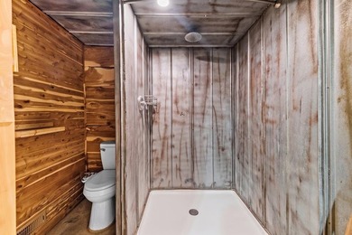 Tucked away among nearly 39 acres of towering timber, this East - photo 33