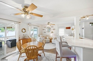 Waterfront, newly renovated retreat on Lake Hopatcong! Tucked - photo 7