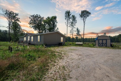 (private lake, pond, creek) Home Sale Pending in Shepherd Michigan