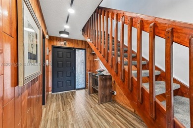 Beautiful lakefront townhouse! Featuring a brand-new 2026 roof - photo 3