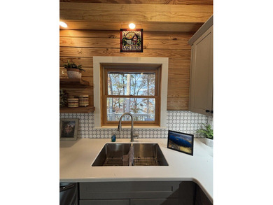 Beautiful cabin style lake front home with year round water! - photo 13