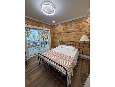 Beautiful cabin style lake front home with year round water! - photo 19