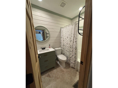 Beautiful cabin style lake front home with year round water! - photo 20