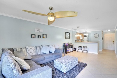 Welcome to this inviting first-floor condo in a gated community - photo 1