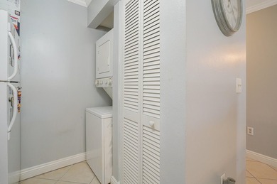 Welcome to this inviting first-floor condo in a gated community - photo 6
