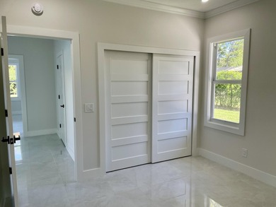 Welcome to this reimagined 4-bedroom, 3-bathroom, pool home in - photo 11