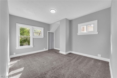 This colonial home in Euclid offers comfort, updates, and - photo 15