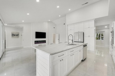 Welcome to this reimagined 4-bedroom, 3-bathroom, pool home in - photo 15