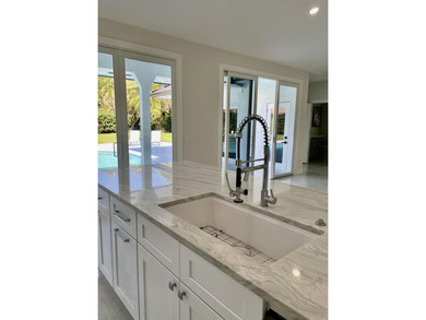 Welcome to this reimagined 4-bedroom, 3-bathroom, pool home in - photo 20