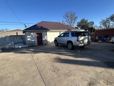 Charming 2 story home with original woodwork.  Covered front