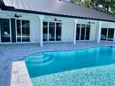 Welcome to this reimagined 4-bedroom, 3-bathroom, pool home in - photo 38
