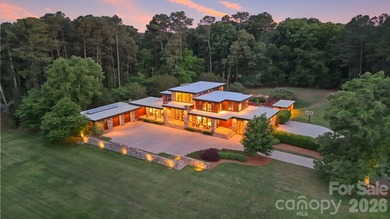 THE RANCH AT FAIRES RD: A Modern Equestrian Estate. Set quietly - photo 39
