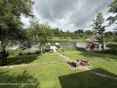 Lakefront living at Lake Winola with 120 feet of lake frontage! - photo 15