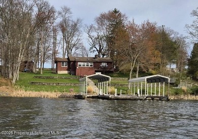 Lakefront living at Lake Winola with 120 feet of lake frontage! - photo 16