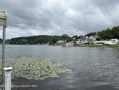 Lakefront living at Lake Winola with 120 feet of lake frontage! - photo 17