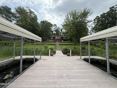 Lakefront living at Lake Winola with 120 feet of lake frontage! - photo 20