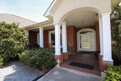 Incredible brick ranch home on Woodlake Golf course! Sits on top - photo 2