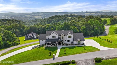 Exquisite Custom Estate in Rock Harbor with Panoramic Lake Views - photo 12