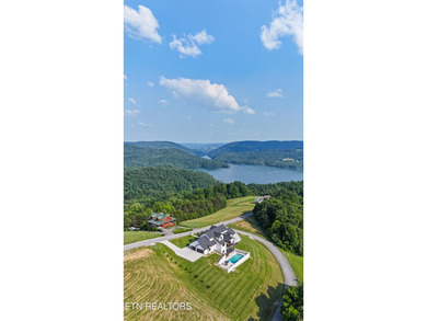 Exquisite Custom Estate in Rock Harbor with Panoramic Lake Views - photo 16