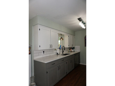 Cozy starter home at just under 1450sq ft, but sits in a great - photo 18