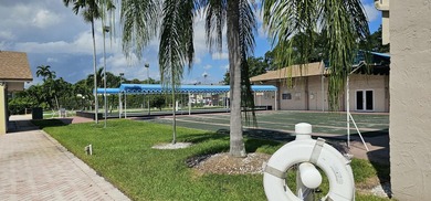 Beautiful BAHAMAS STYLE, 1BD/1.5BA ground-floor condo in a - photo 18