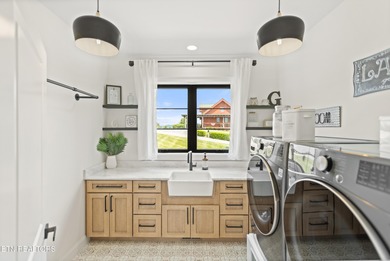 Exquisite Custom Estate in Rock Harbor with Panoramic Lake Views - photo 25