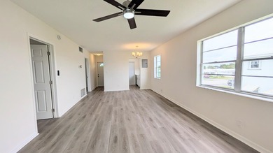 Don't miss this beautifully updated 2BR/1BA second-floor corner - photo 3