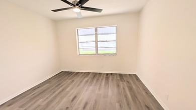 Don't miss this beautifully updated 2BR/1BA second-floor corner - photo 7