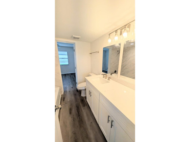 Don't miss this beautifully updated 2BR/1BA second-floor corner - photo 8
